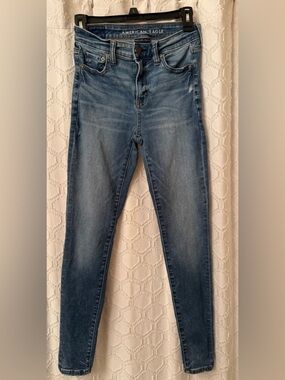 American Eagle Distressed High Rise Jegging Outfitters Light Blue Denim Size 4